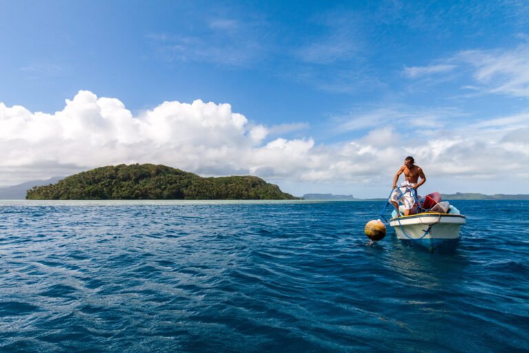 Man With Boat in Micronesia