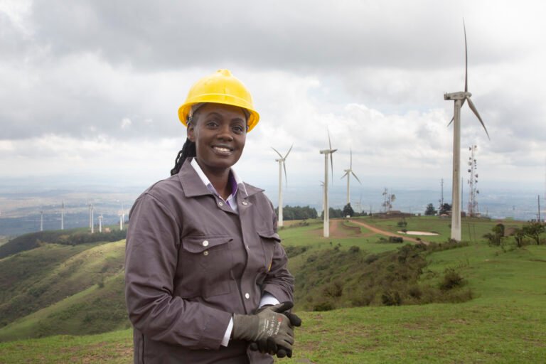 Kaarinah Luvongo overlooks the turbines at the Ngong Wind Power Station in Ngong, Kenya.