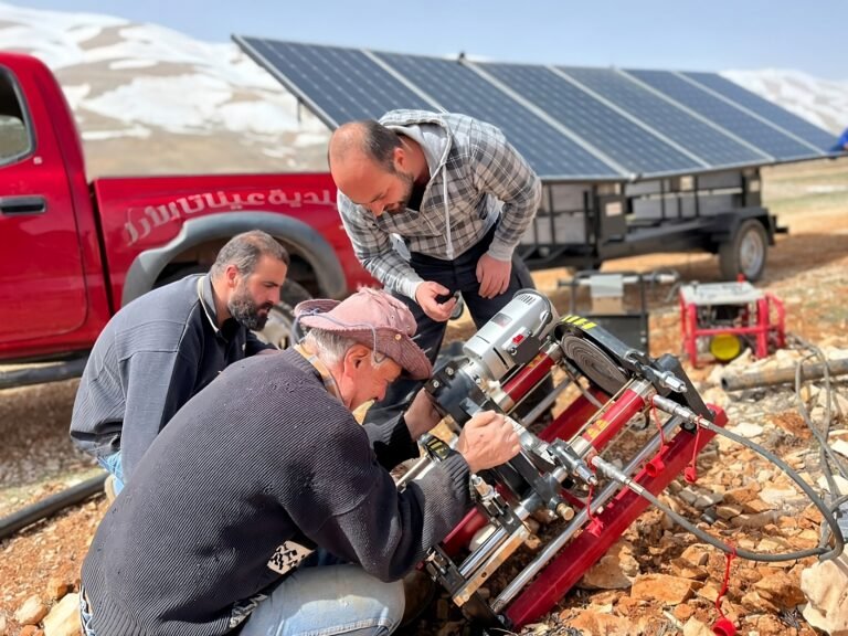 A farmer uses a USAID/CSP provided solar-powered mobile welding station to repair irrigation lines, minimize water losses, and maintain livelihoods amidst ongoing economic crises through renewable energy solutions – Ainata el Arz, Beqaa