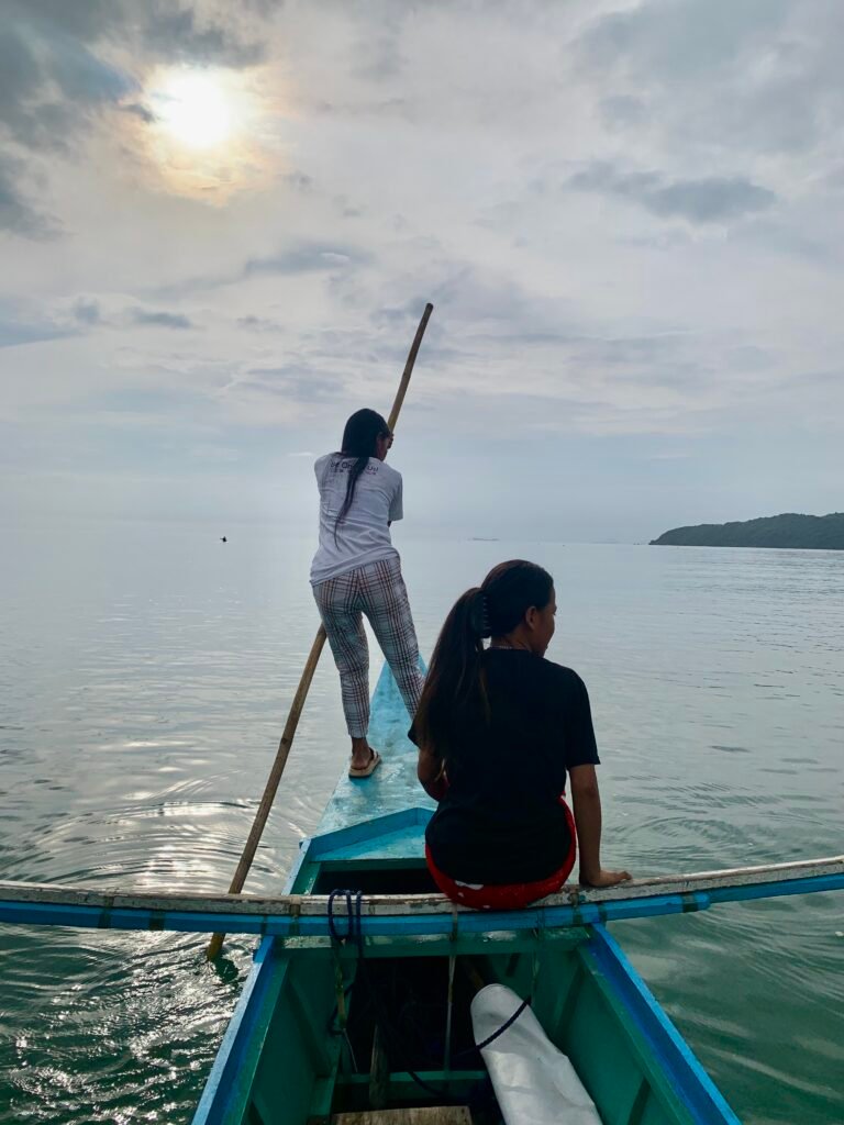 Young Tagbanua women off to monitor the women-managed area of their ancestral water.