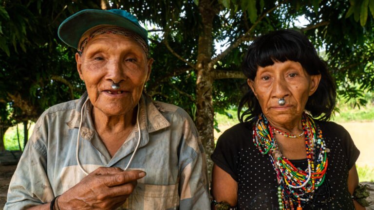 Siopiti and Candida Sandoval, members of a remote tribe living as refugees along the Amazon border between Peru and Brazil