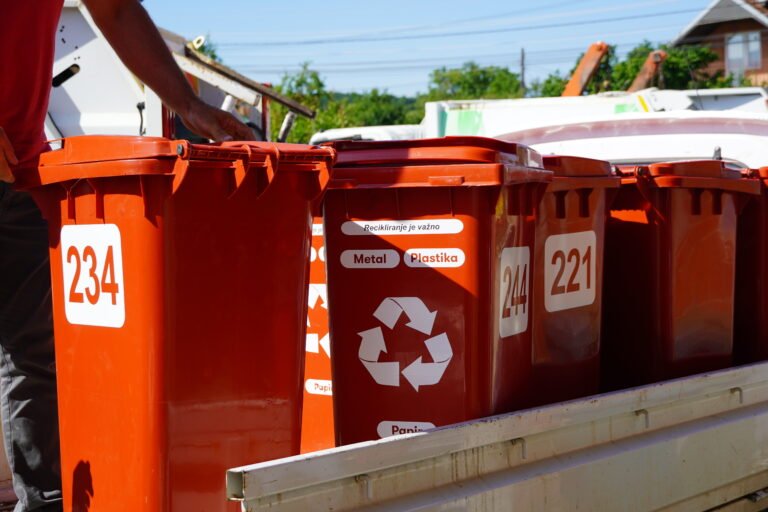 Red plastic recycling bins ready for distribution in households in Gračanica/Graçanicë