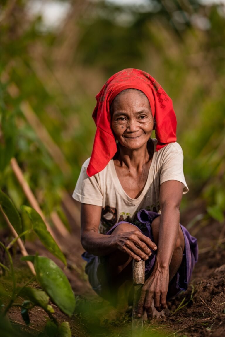 Woman farmer tending to her ube plot in Palawan, Philippines