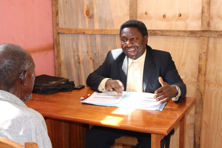 Mwenga is a local lawyer who volunteers his time and expertise at a free legal clinic near South Kivu